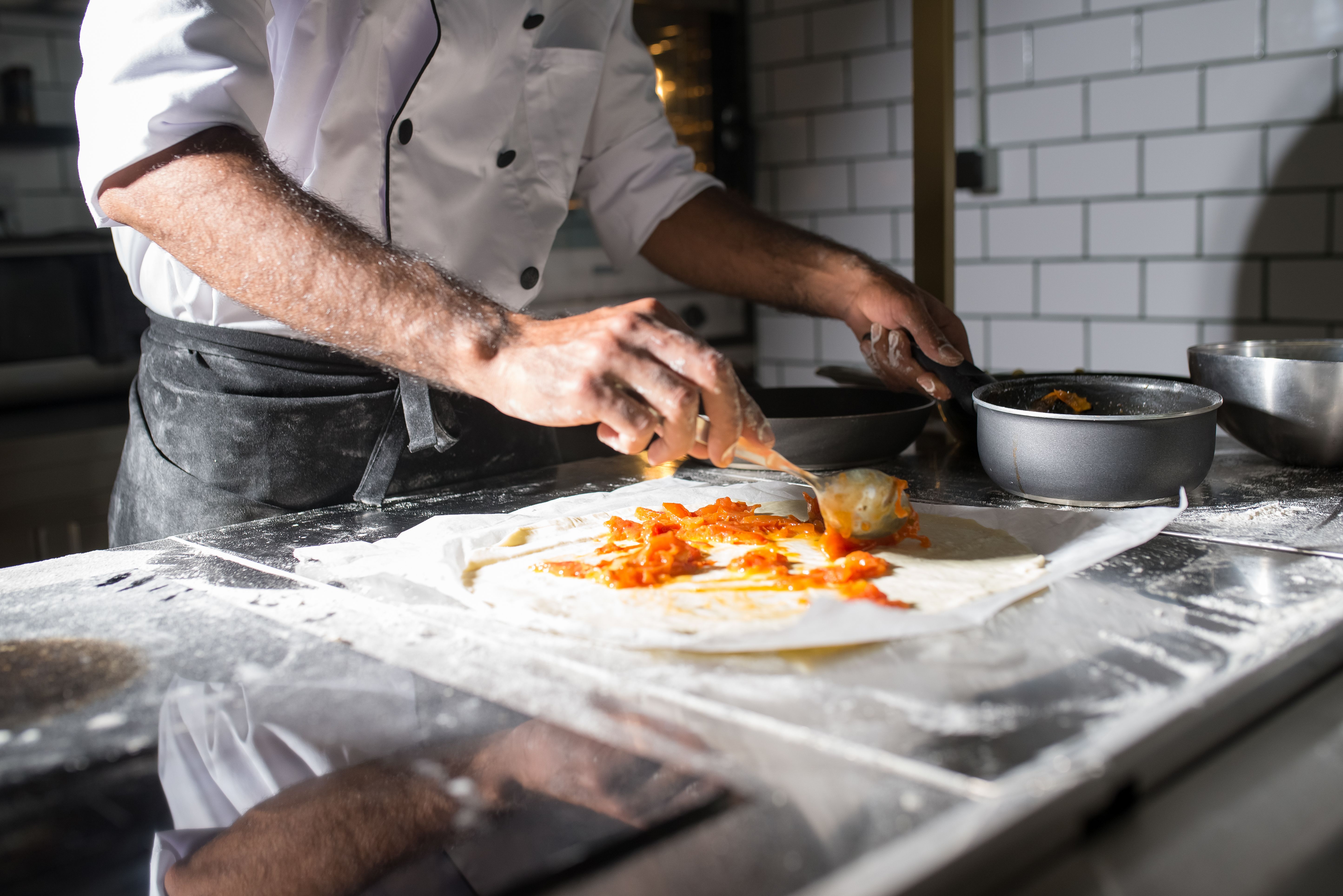 Chef preparing food in a professional kitchen